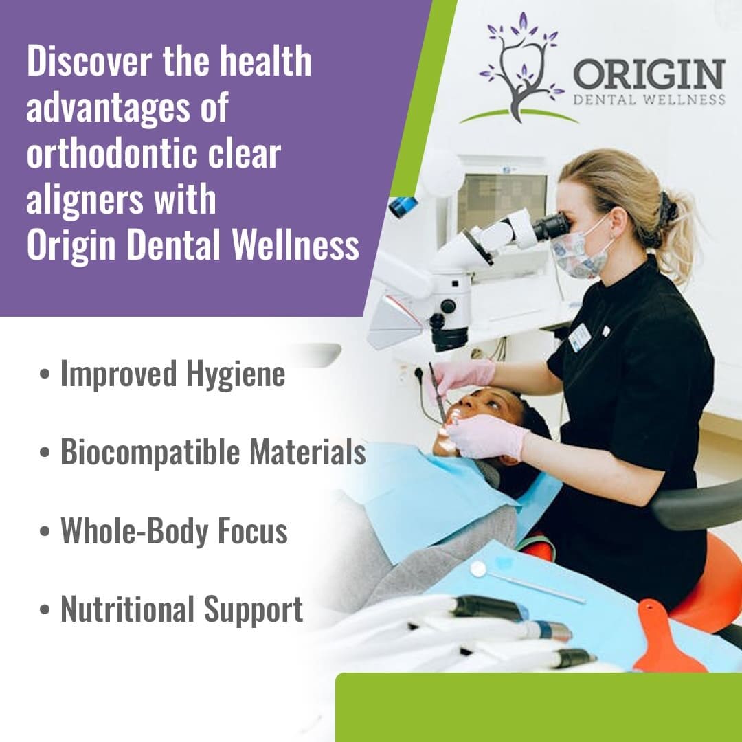 A dentist working on a patient while looking through a dental microscope.